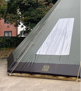 A tent with a door and a wooden door

AI-generated content may be incorrect., Picture